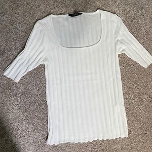 White knitted blouse